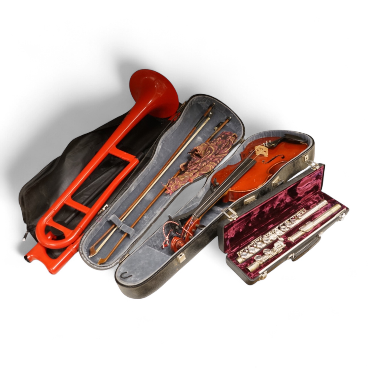 Three musical instruments to include a Buffet flute and violin with two bows